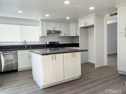 Interior, Kitchen, Recessed Lighting, Stainless Steel Appliances, Wood Texture Flooring