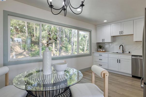 Dining room, Interior, Kitchen, Recessed Lighting, Stainless Steel Appliances, Wood Texture Flooring
