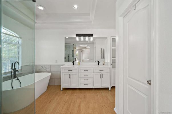 Bathroom, Dual Sink Vanities, Free Standing Baths, Interior, Recessed Lighting, Wood Texture Flooring