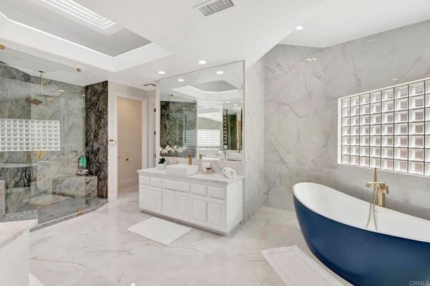 Bathroom, Dual Sink Vanities, Free Standing Baths, Glass Shower, Interior, Marble, Marble Walls, Recessed Lighting
