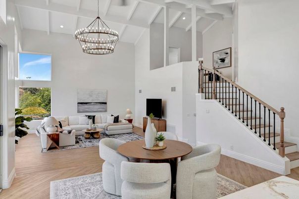 Chandelier, Dining room, Fireplace, Interior, Living room, Pendant Lights, Recessed Lighting, Wood Texture Flooring