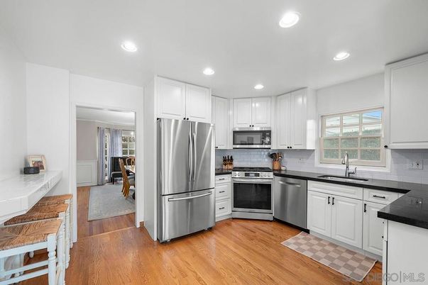 Dining room, Interior, Kitchen, Recessed Lighting, Stainless Steel Appliances, Wood Texture Flooring