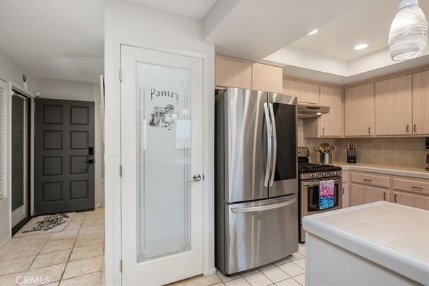 Interior, Kitchen, Recessed Lighting, Stainless Steel Appliances, Tile Countertops