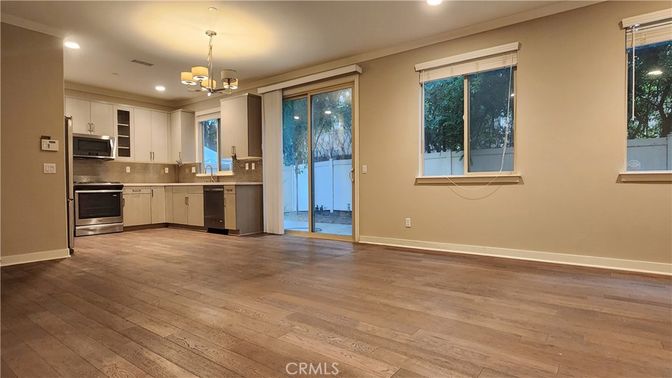Chandelier, Interior, Kitchen, Recessed Lighting, Stainless Steel Appliances, Wood Texture Flooring