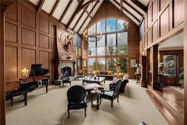 Chandelier, Fireplace, Interior, Living room, Piano, Wooden Beams, Wood Texture Flooring, Wooden Walls