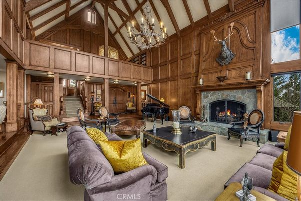 Chandelier, Fireplace, Interior, Living room, Piano, Wooden Beams, Wooden Walls
