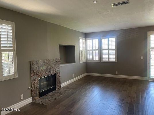 Empty room, Fireplace, Interior, Recessed Lighting, Wood Texture Flooring