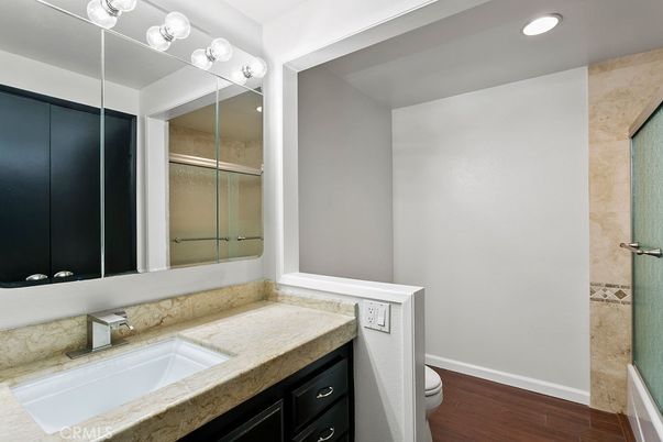 Bathroom, Glass Shower, Interior, Recessed Lighting, Wood Texture Flooring