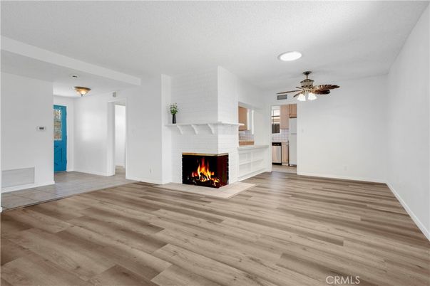 Empty room, Fireplace, Interior, Recessed Lighting, Wood Texture Flooring