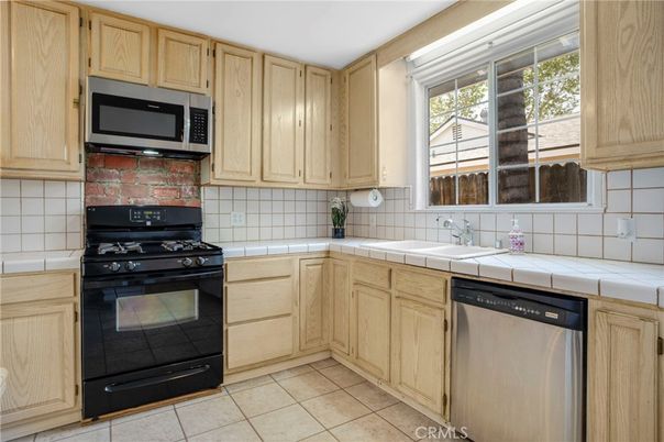 Interior, Kitchen, Stainless Steel Appliances, Tile Countertops