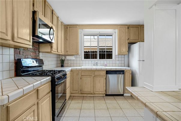 Interior, Kitchen, Stainless Steel Appliances, Tile Countertops