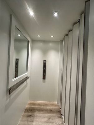 Elevator, Interior, Recessed Lighting, Wood Texture Flooring