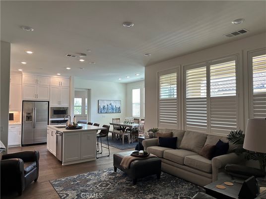 Dining room, Interior, Kitchen, Living room, Recessed Lighting, Stainless Steel Appliances, Wood Texture Flooring
