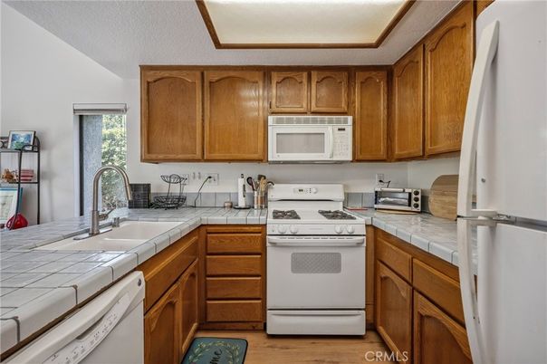 Interior, Kitchen, Tile Countertops, Wood Texture Flooring