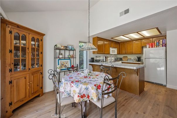 Dining room, Interior, Kitchen, Pendant Lights, Tile Countertops, Wood Texture Flooring
