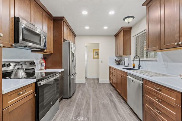 Interior, Kitchen, Recessed Lighting, Stainless Steel Appliances, Wood Texture Flooring