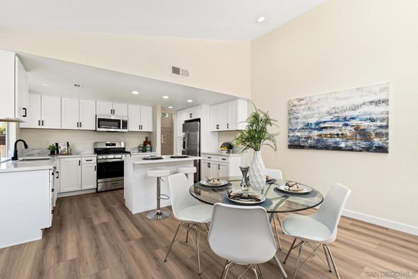 Dining room, Interior, Kitchen, Recessed Lighting, Stainless Steel Appliances, Wood Texture Flooring