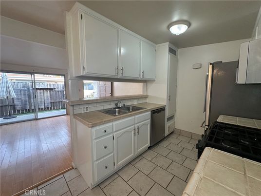 Interior, Kitchen, Tile Countertops, Wood Texture Flooring