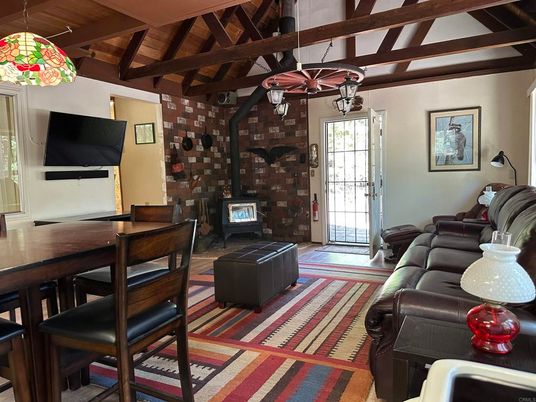 Dining room, Fireplace, Interior, Living room, Pendant Lights, Stone Walls, Wooden Beams, Wooden Ceilings