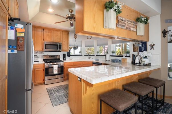 Interior, Kitchen, Recessed Lighting, Stainless Steel Appliances, Tile Countertops