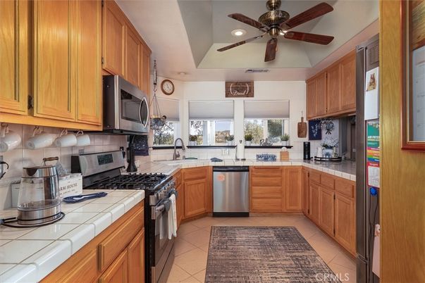 Interior, Kitchen, Recessed Lighting, Stainless Steel Appliances, Tile Countertops
