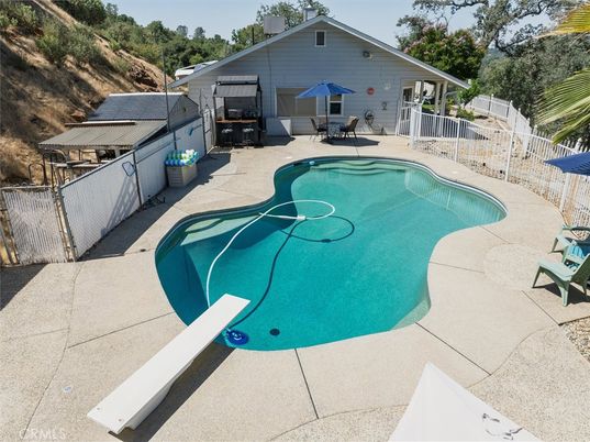 Exterior, Pool, Solar Panels
