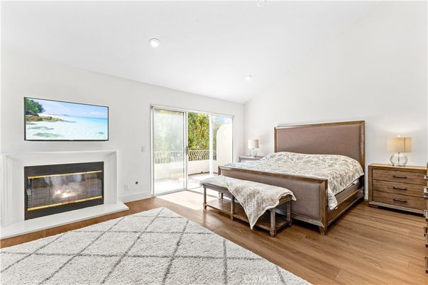 Bedroom, Fireplace, Interior, Recessed Lighting, Wood Texture Flooring