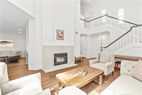 Fireplace, Interior, Living room, Recessed Lighting, Wood Texture Flooring