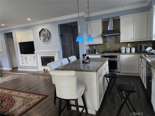 Fireplace, Interior, Kitchen, Pendant Lights, Recessed Lighting, Wood Texture Flooring