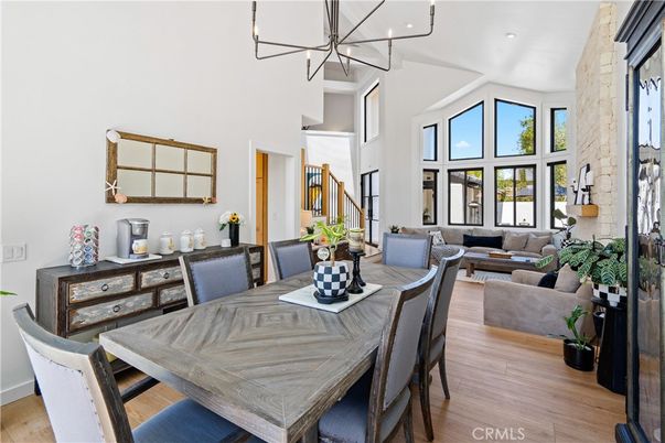 Dining room, Fireplace, Interior, Living room, Pendant Lights, Recessed Lighting, Stone Walls, Wood Texture Flooring