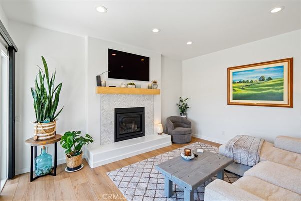 Fireplace, Interior, Living room, Recessed Lighting, Wood Texture Flooring