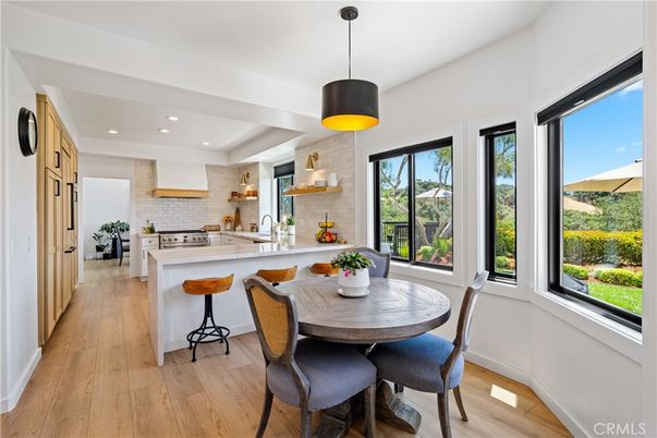 Dining room, Interior, Kitchen, Pendant Lights, Recessed Lighting, Stainless Steel Appliances, Wood Texture Flooring