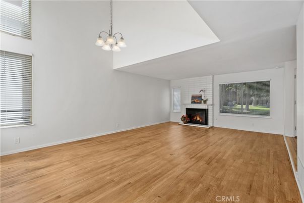 Empty room, Fireplace, Interior, Pendant Lights, Wood Texture Flooring