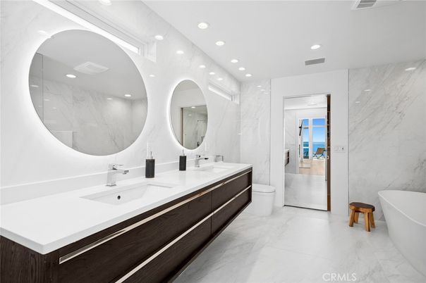 Bathroom, Dual Sink Vanities, Free Standing Baths, Interior, Marble, Marble Walls, Recessed Lighting, Water