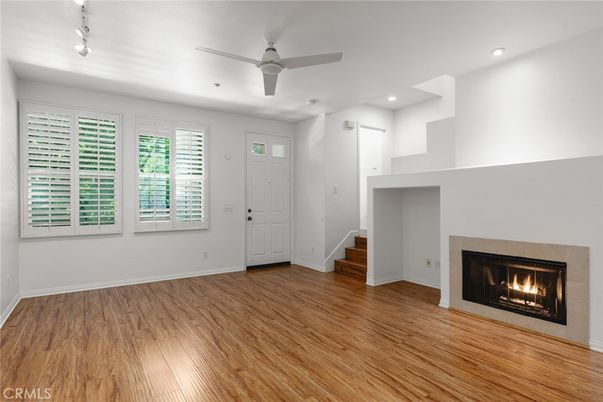 Empty room, Fireplace, Interior, Recessed Lighting, Wood Texture Flooring