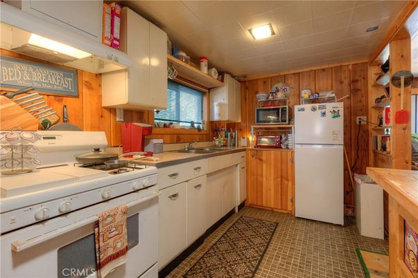 Interior, Kitchen, Tile Countertops, Wooden Walls