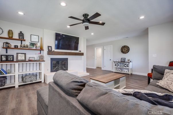 Fireplace, Interior, Living room, Recessed Lighting, Wood Texture Flooring