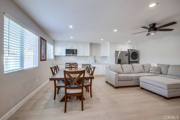 Dining room, Interior, Kitchen, Living room, Recessed Lighting, Stainless Steel Appliances, Wood Texture Flooring