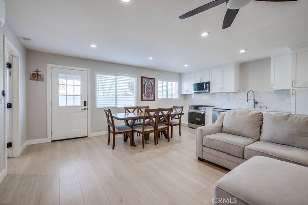 Dining room, Interior, Kitchen, Living room, Recessed Lighting, Stainless Steel Appliances, Wood Texture Flooring