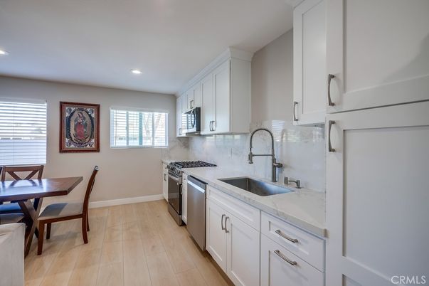Dining room, Interior, Kitchen, Recessed Lighting, Stainless Steel Appliances, Wood Texture Flooring