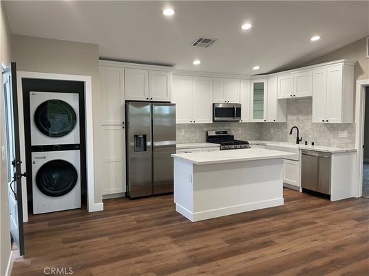 Interior, Kitchen, Recessed Lighting, Stainless Steel Appliances, Washer, Wood Texture Flooring