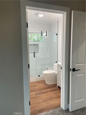 Bathroom, Glass Shower, Interior, Recessed Lighting, Wood Texture Flooring