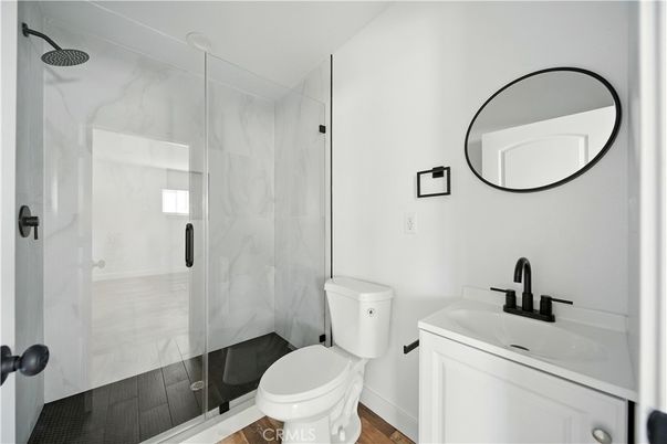Bathroom, Glass Shower, Interior, Marble Walls, Wood Texture Flooring