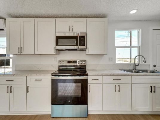 Interior, Kitchen, Recessed Lighting, Stainless Steel Appliances, Wood Texture Flooring