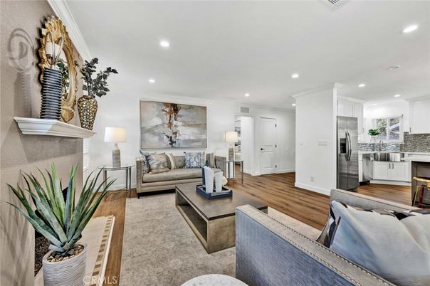 Fireplace, Interior, Kitchen, Living room, Recessed Lighting, Stainless Steel Appliances, Wood Texture Flooring