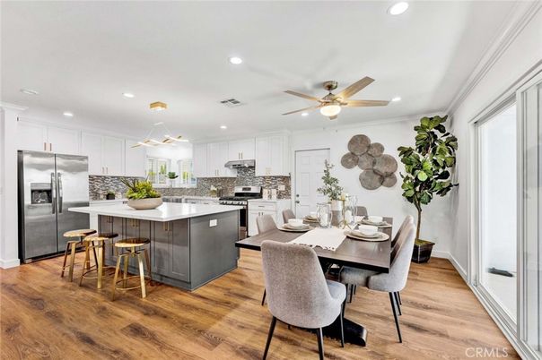 Dining room, Interior, Kitchen, Pendant Lights, Recessed Lighting, Stainless Steel Appliances, Wood Texture Flooring