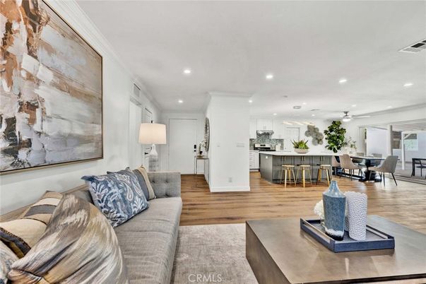 Dining room, Interior, Kitchen, Living room, Recessed Lighting, Stainless Steel Appliances, Wood Texture Flooring