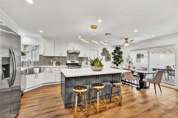 Dining room, Interior, Kitchen, Pendant Lights, Recessed Lighting, Stainless Steel Appliances, Wood Texture Flooring