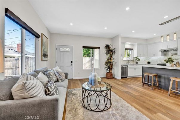 Interior, Kitchen, Living room, Marble Walls, Pendant Lights, Recessed Lighting, Stainless Steel Appliances, Wood Texture Flooring