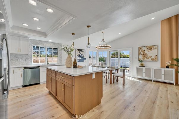 Dining room, Interior, Kitchen, Pendant Lights, Recessed Lighting, Stainless Steel Appliances, Wood Texture Flooring